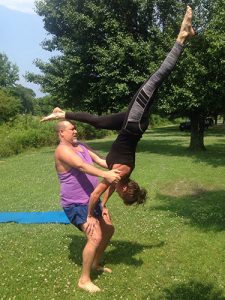 acro yoga thigh stand handstand